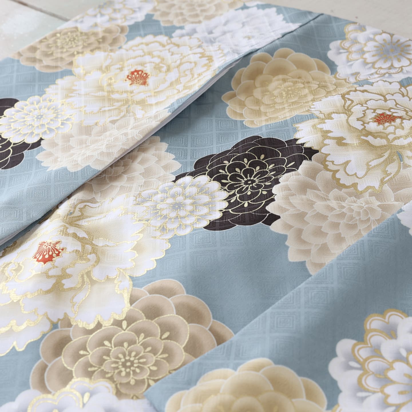 花柄の青い産着