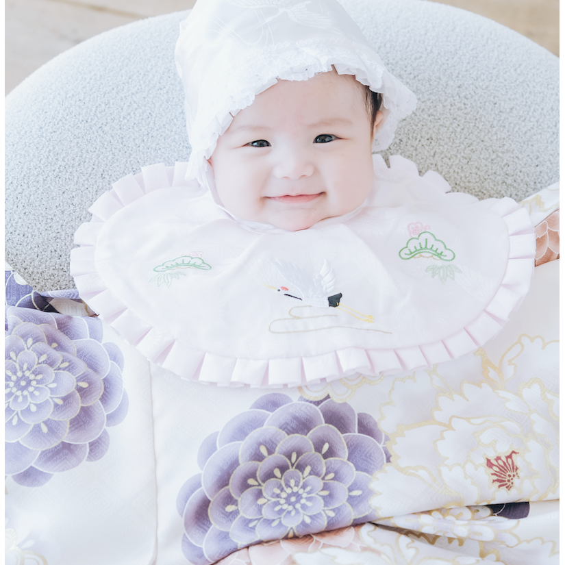 ピンクに花柄の産着